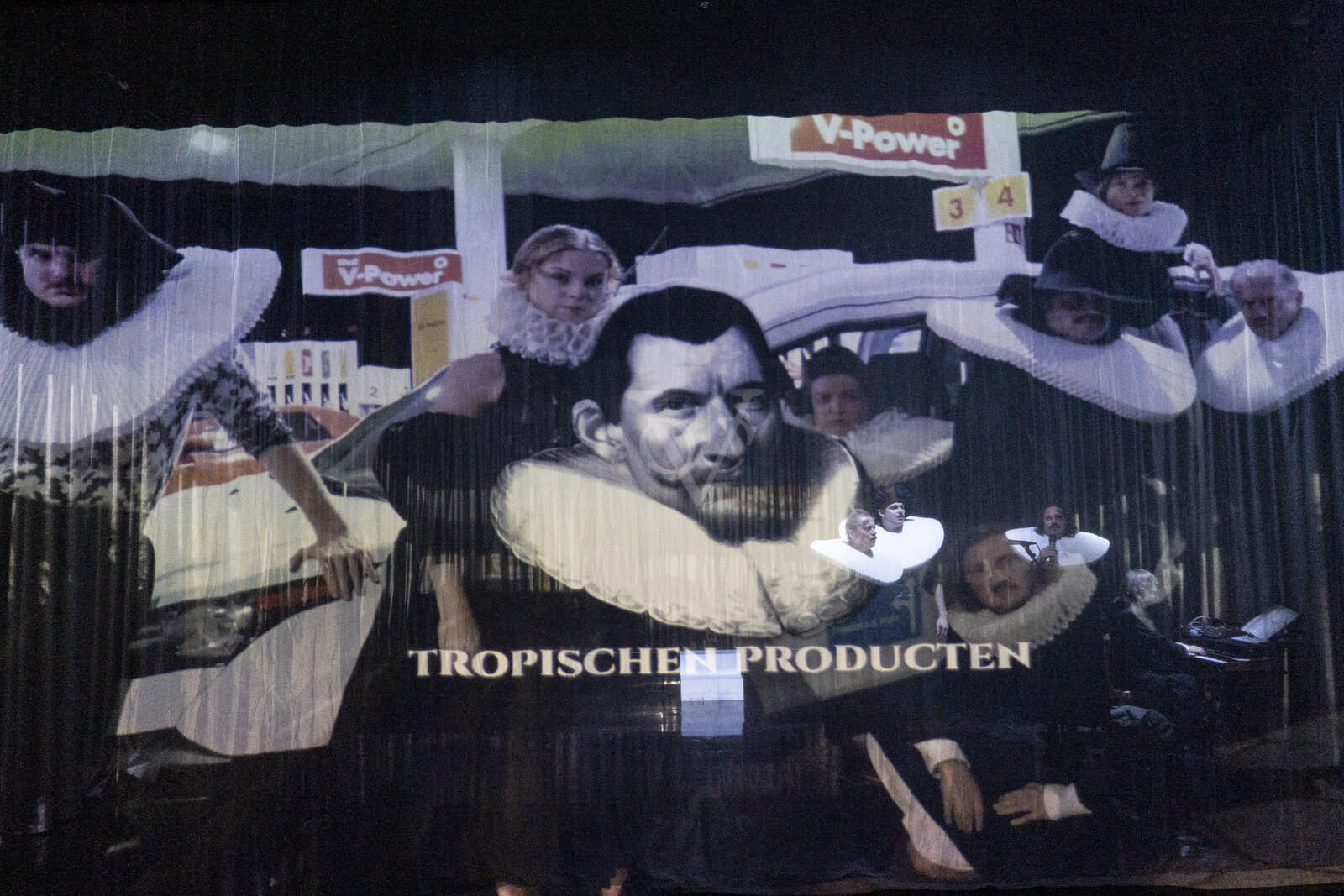 A large projection on a gauze, with the defendant Ruprecht standing behind it.