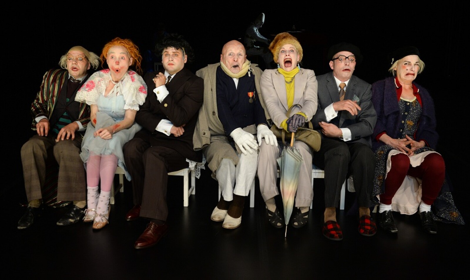 The clowns on chairs