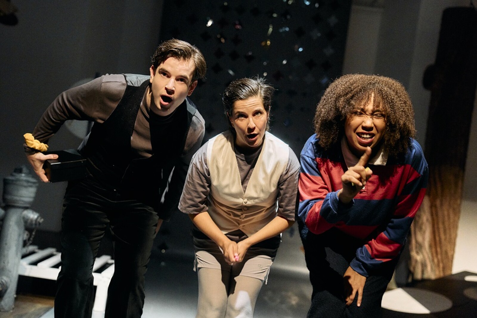 three people on stage